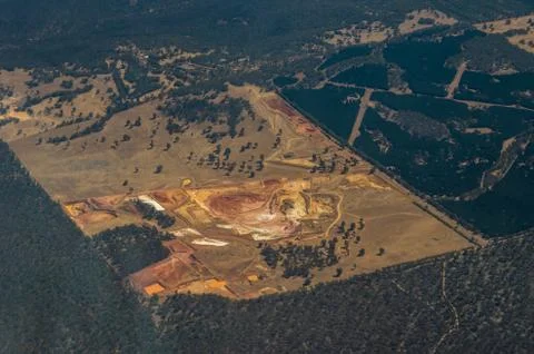 Top down view of industrial mining and quarry production sites in remote West Stock Photos