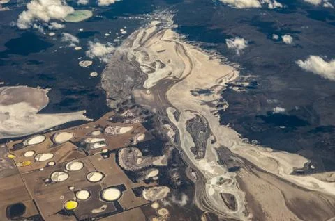 Top down view of industrial mining and quarry production sites in remote West Stock Photos