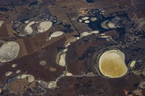 Top down view of industrial mining and quarry production sites in remote West Stock Photos