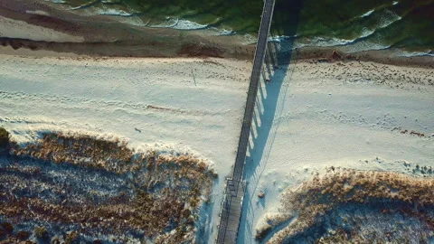 Top-down view. Jetty Sunset over ocean South Australia - Christies Beach Christi Stock Footage 294619549
