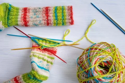 Top down view of knitting project with wool yarn Stock Photos