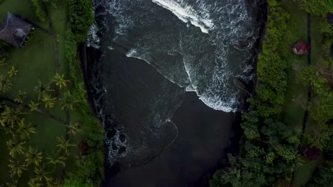 Top down view on lagoon with black sand Stock Footage 157905280
