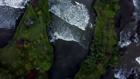 Top down view on lagoon with black sand Stock Footage 158098001