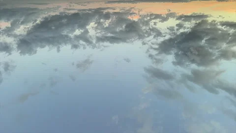Top down view of Layered Clouds Across Blue Evening Sky Background. Time Laps Stock Footage 347809985