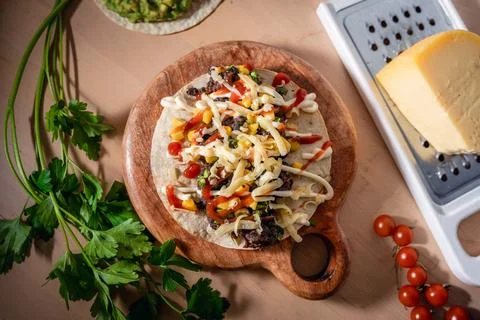Top down view of mexican taco with black beans, known as frijoles negros, w.. Stock Photos