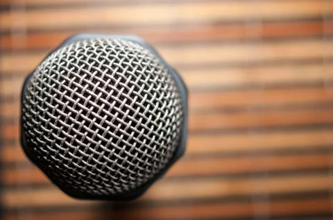 Top-Down View of A Microphone Head and Silver Grille Stock Photos