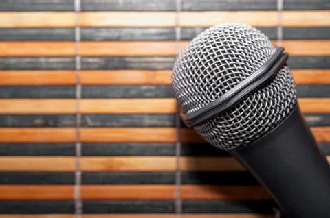 Top-Down View of A Microphone Head and Silver Grille Stock Photos