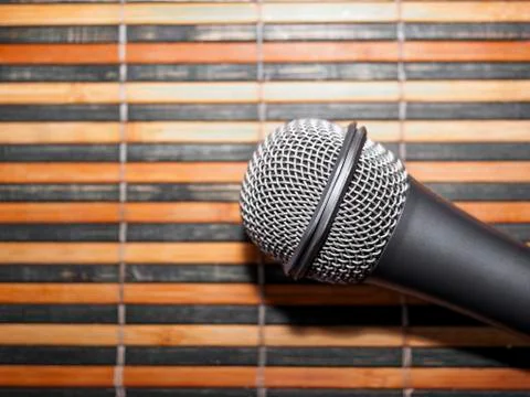 Top-Down View of A Microphone Head and Silver Grille Stock Photos