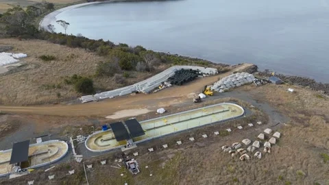 Top-down view of a modern aquaculture site with water filtration tanks. Vídeo Stock 332542707