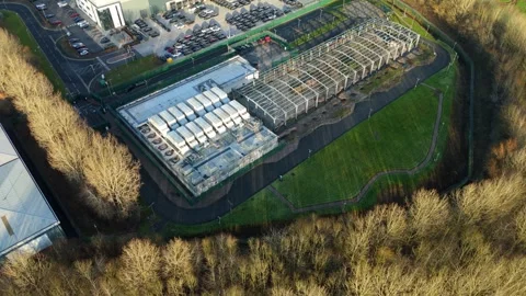 Top down view of a modern industrial building housing AI processing units and Stock Footage 333542499