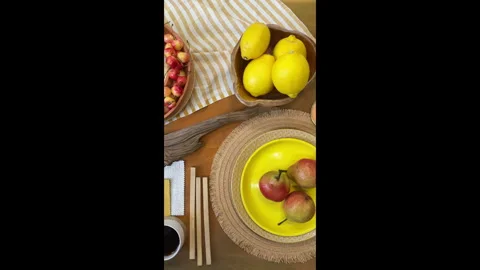 Top-down view of a mood board and color palette arrangement featuring fruits, ta 库存影片 311848312