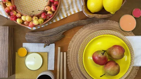 Top-down view of a mood board and color palette arrangement featuring fruits, ta Video stock 311848929