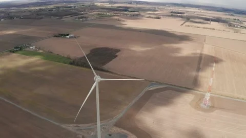 Top down view of a none functioning wind turbine. Camera slowly arcs and 動画素材 145537551
