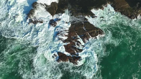 Top Down View of Ocean Waves and Coastal Foam Pattern Stock Footage 340122133