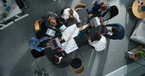 Top Down View Office Meeting with Business Statistics Zoom out Stockbeeldmateriaal 295205244