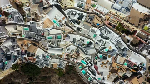 Top down view of Oia village on top of a cliff in Santorini Greece Stock Footage 219496093