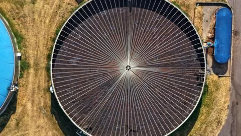 Top Down View of Open Biogas Digester Tank with Radial Pattern Stock Photos