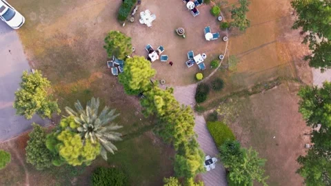 Top Down View Of Outdoor Restaurant Garden With Tables And Trees Stock Footage 331365436
