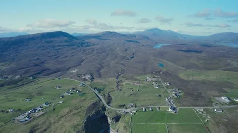 Top Down view over Geodha Smoo and Smoo Cave Cliffs from a drone, North Scotland Stock Footage 197556408