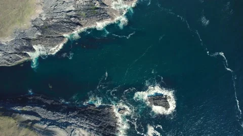 Top Down view over Geodha Smoo and Smoo Cave Cliffs from a drone, North Scotland Stock Footage 197557891