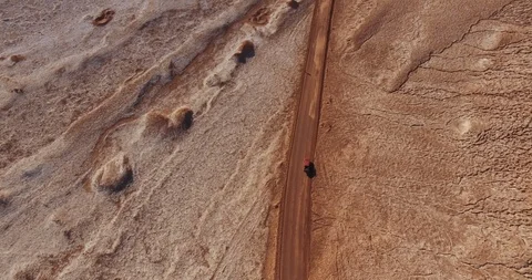 Top down view over the road in an unusual desert terrain of the Moon Valley in 動画素材 121817110