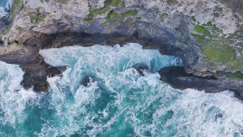 Top Down view over Waves and Cliffs from a drone, Cornwall, England Video stock 247899079