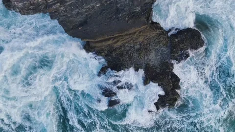 Top Down view over Waves and Cliffs from a drone, Cornwall, England Stock Footage 248055898
