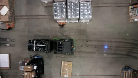 Top down view parcel transportation in large warehouse, chain supply Stock Footage 239611198