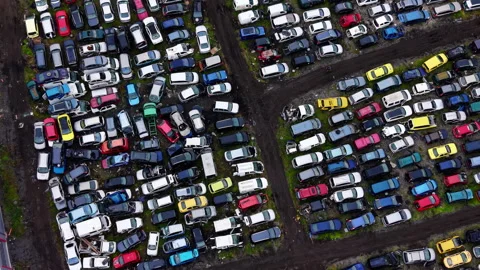 Top down view of parked scrap vehicles, Bulgaria Stock Footage 340409699