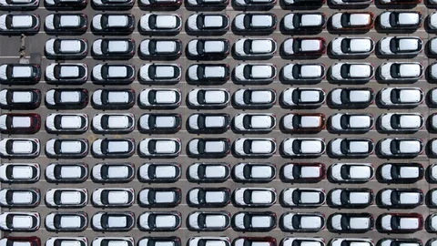 Top Down View of Parking Lot Filled with Brand New Cars, Automobile Industry Stock Footage 98998537