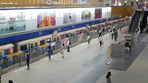 Top down view to passengers traveller walking on subway platform station af.. Stock Footage 256858893