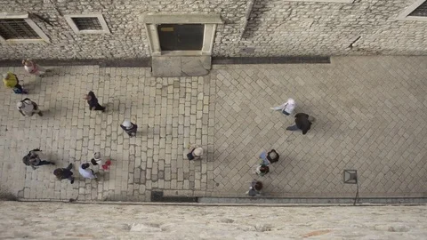 Top Down View of Pedestrians walking Dubrovnik street, Croatia, Mediterranean Stock Footage 80156440