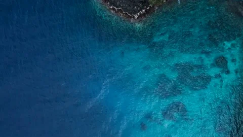 Top down view on peninsula and beatiful blue water Stock Footage 157933204