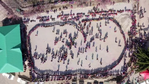 Top Down View Of People Celebrating The Holi Festival In Sangla Village, Stock Footage 246689583