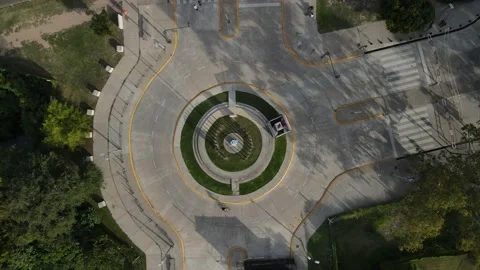 Top down view of people cycling in roundabout at sunset Stock-Footage 153787218