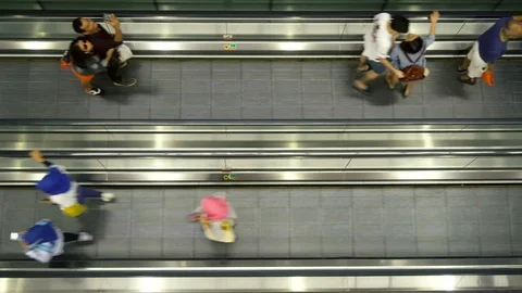 Top Down View of People on Moving Walkway at Airport Stock Footage 115629810