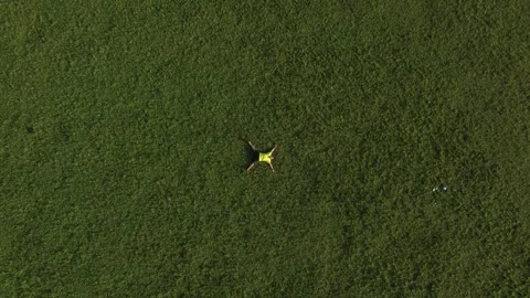 Top down view People relaxing on the green grass in the morning 스톡 동영상 271114789