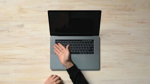 Top-down view of a person demonstrating the virtual function keys on the Video stock 133850899