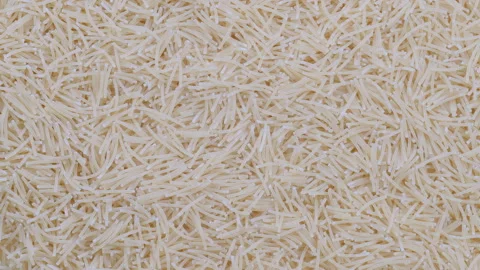 Top down view. Pile of uncooked vermicelli pasta. Slider shot. Stock Footage 296523777