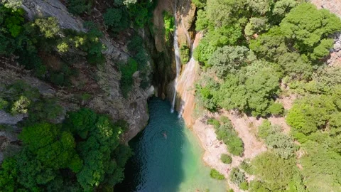 Top Down View of Polylimnio Waterfall and Pool Stock-Footage 334899999