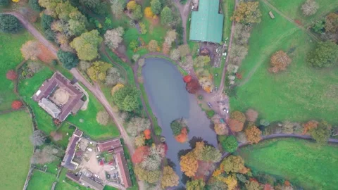 Top down view of ponds and park from a drone in Autumn Colors, Exeter, Devon Stock-Footage 165157954