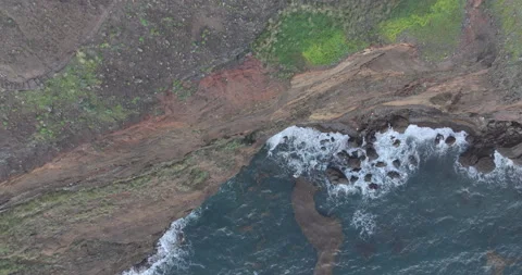 Top down view of Ponta de São Lourenço cliffs and waves in Madeira Видео 346650331