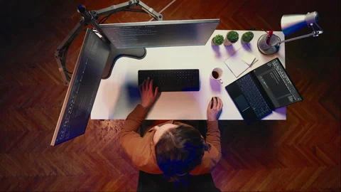 Top down view of remote worker typing code in personal office Stock Footage 265622683