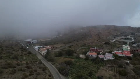 Top-down view of residential areas covered in fog in Arabia Stock Footage 263277645