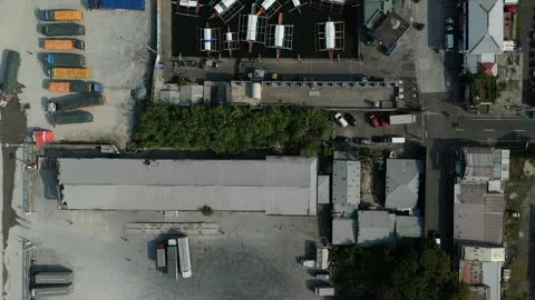 Top-down view reveals a busy loading dock for locals. 스톡 동영상 335588484