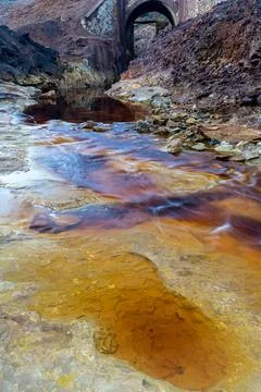 Top down view of the Rio Tinto riverbed in the old mines with colorful iron and Stock Photos