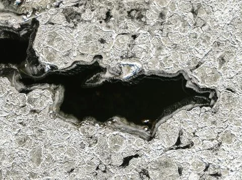 Top down view of river and floes in winter. Stock Photos