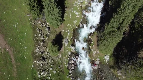 Top Down View Of River Camp And Log Bridge. Kyrgyzstan, Suttuu-Bulak Lake Stock Footage 332943556