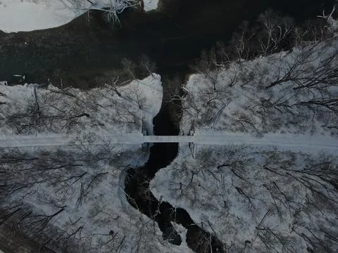 Top down view of river mouth and train track in the winter Stock Photos