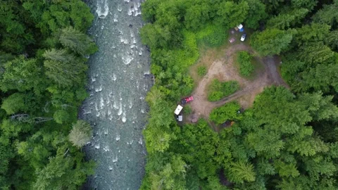 Top down view of the river near camping among the green spruce forest in Canada Stock Footage 158109822
